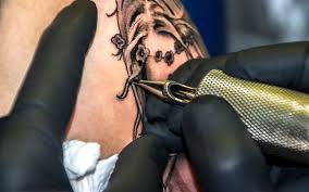 Who can take training to become a tattoo artist?